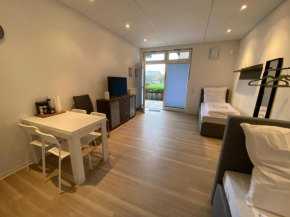 Apartment mit vier Einzelboxspringbetten - Netflix